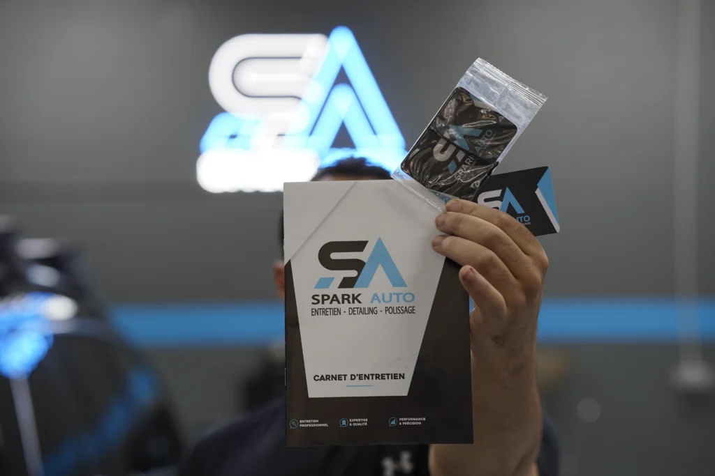 Carnet d'entretien Spark Auto remis au client